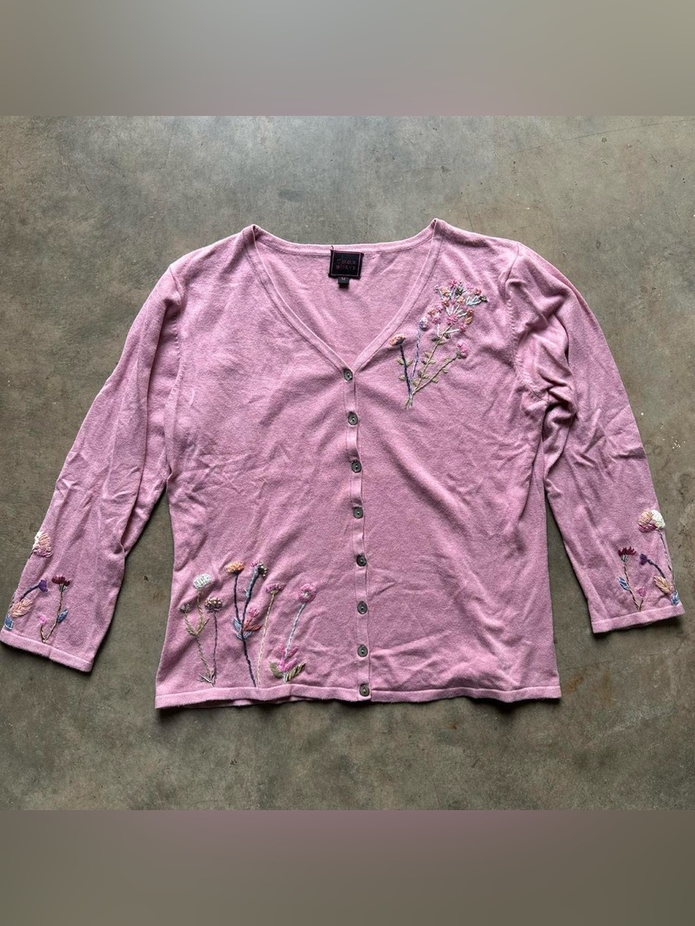 Pink floral cardigan with embroidered flowers and button-up front